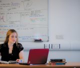 Student studying at a computer