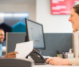 Student and staff member in University Park Central Student Service Centre